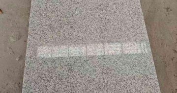 常德芝麻白光面毛板