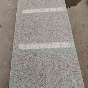 常德芝麻白光面毛板