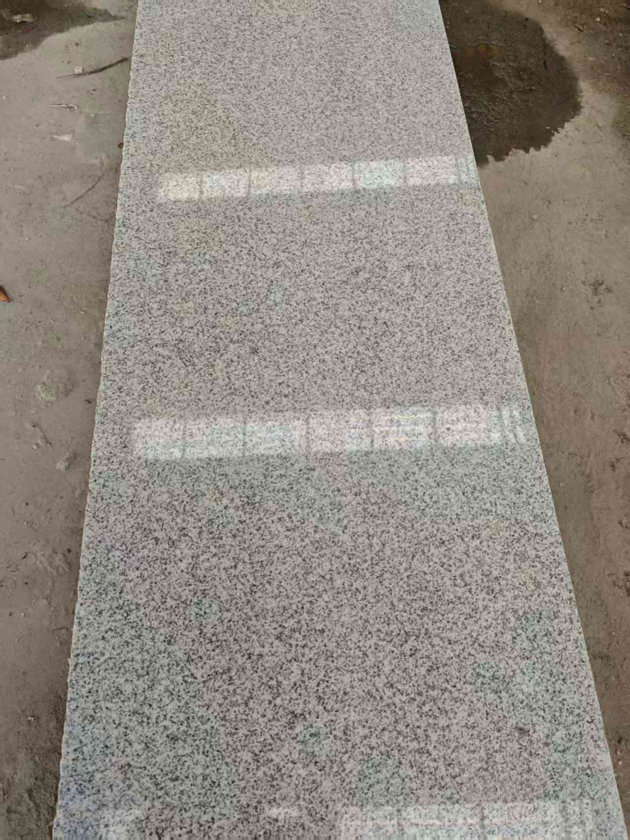 常德芝麻白光面毛板